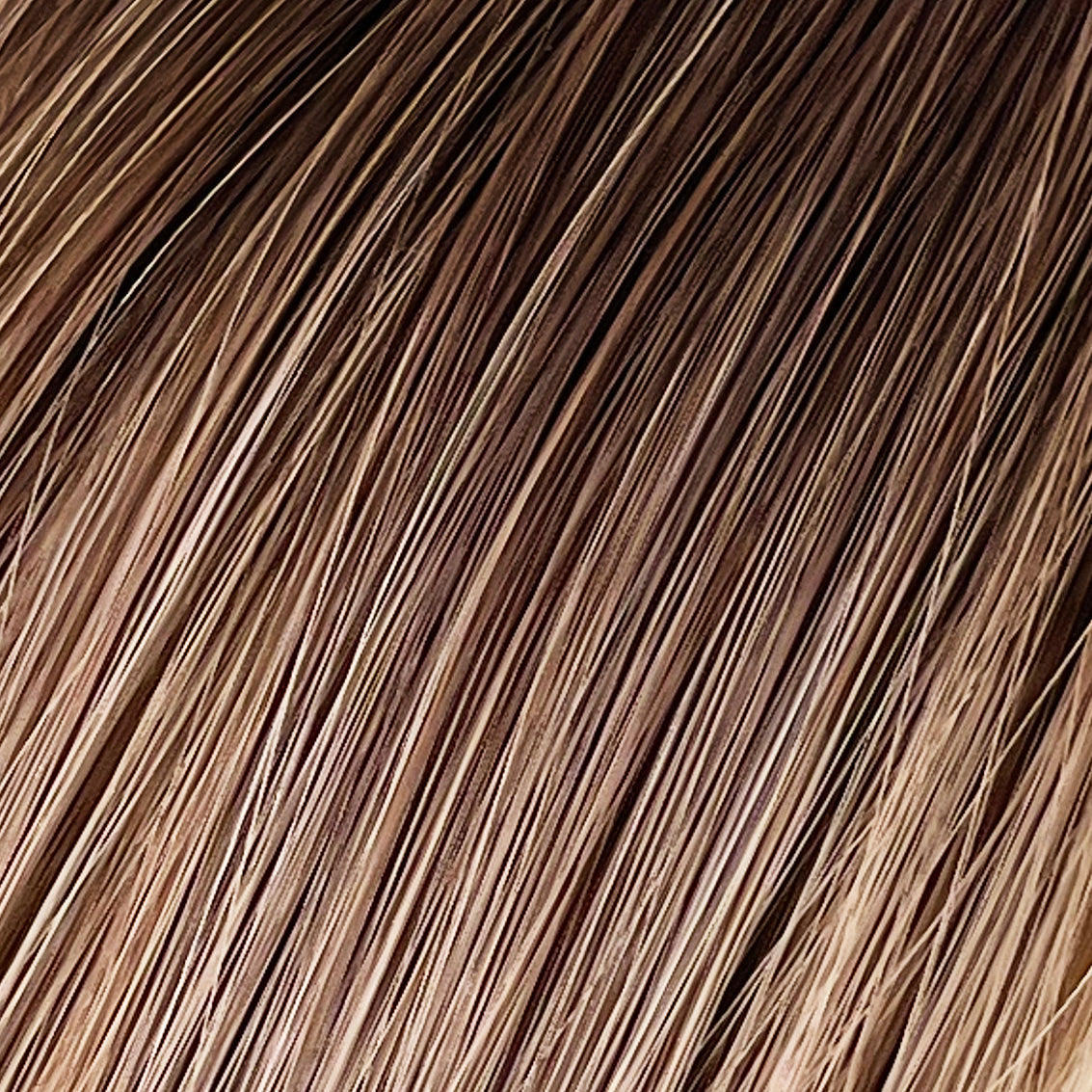 Smoked Topaz is our rooted, neutral brunette blend. Stylist lingo: Natural rooted level 6 blended into a natural/beige level 8 Harloc Tape-In Extensions are made from ethically sourced, premium, Remy Slavic Hair. These reusable hair extensions can be used to add length, volume, chemical-free colour, or to correct or enhance a haircut. Available in 16 beautiful shades. Combine multiple colours to create a custom colour blend and perfect match.