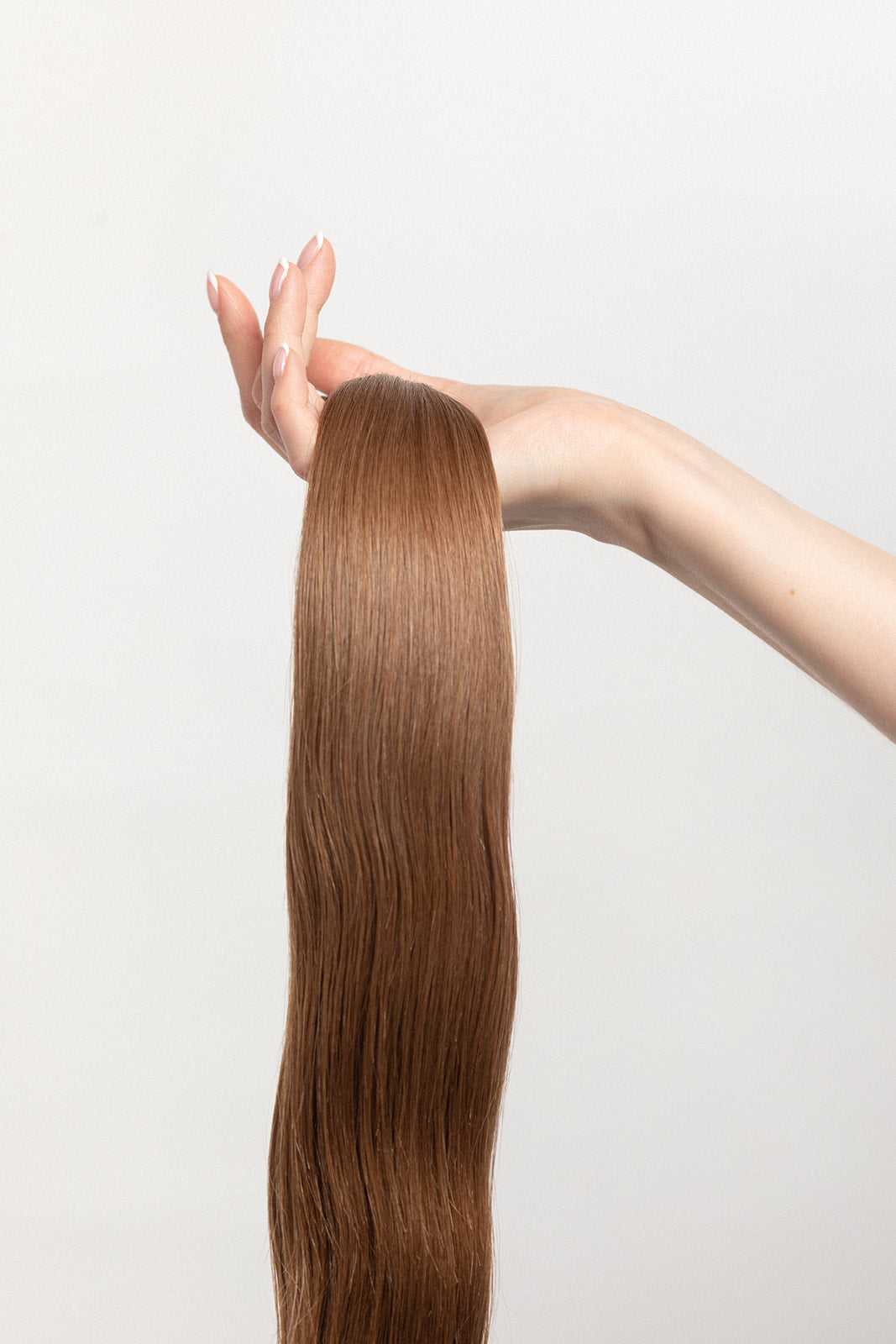 Cedarwood is our light brown, with warm undertones. Take a trip into our candy land, and be sure to stop by the river of chocolate - just to the left of the gumdrop forest. Stylist lingo: Gold level 7 Harloc Tape-In Extensions are made from ethically sourced, premium, Remy Slavic Hair. These reusable hair extensions can be used to add length, volume, chemical-free color, or to correct or enhance a haircut.