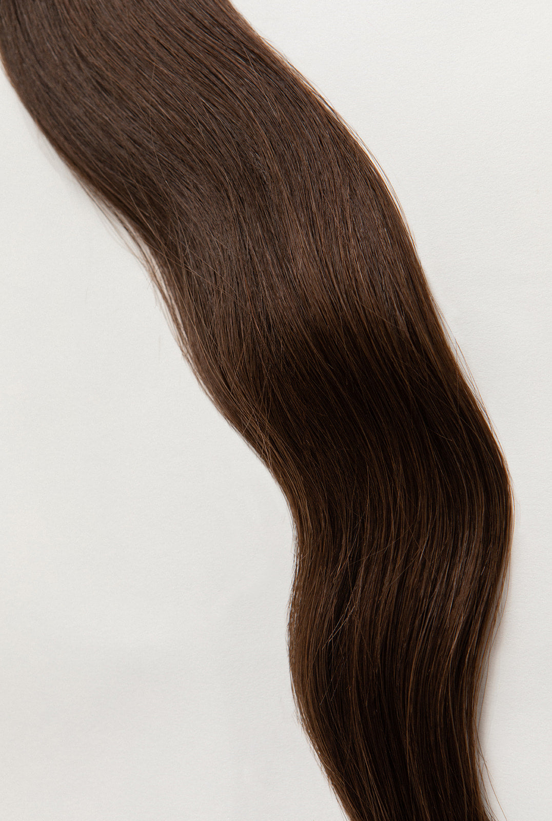 Sage is our medium brown, with golden undertones. This sage doesn’t need to be burned to ward off any bad energy. Stylist lingo: Natural level 6 Harloc Tape-In Extensions are made from ethically sourced, premium, Remy Slavic Hair. These reusable hair extensions can be used to add length, volume, chemical-free colour, or to correct or enhance a haircut. Available in 16 beautiful shades. Combine multiple colours to create a custom colour blend and perfect match.