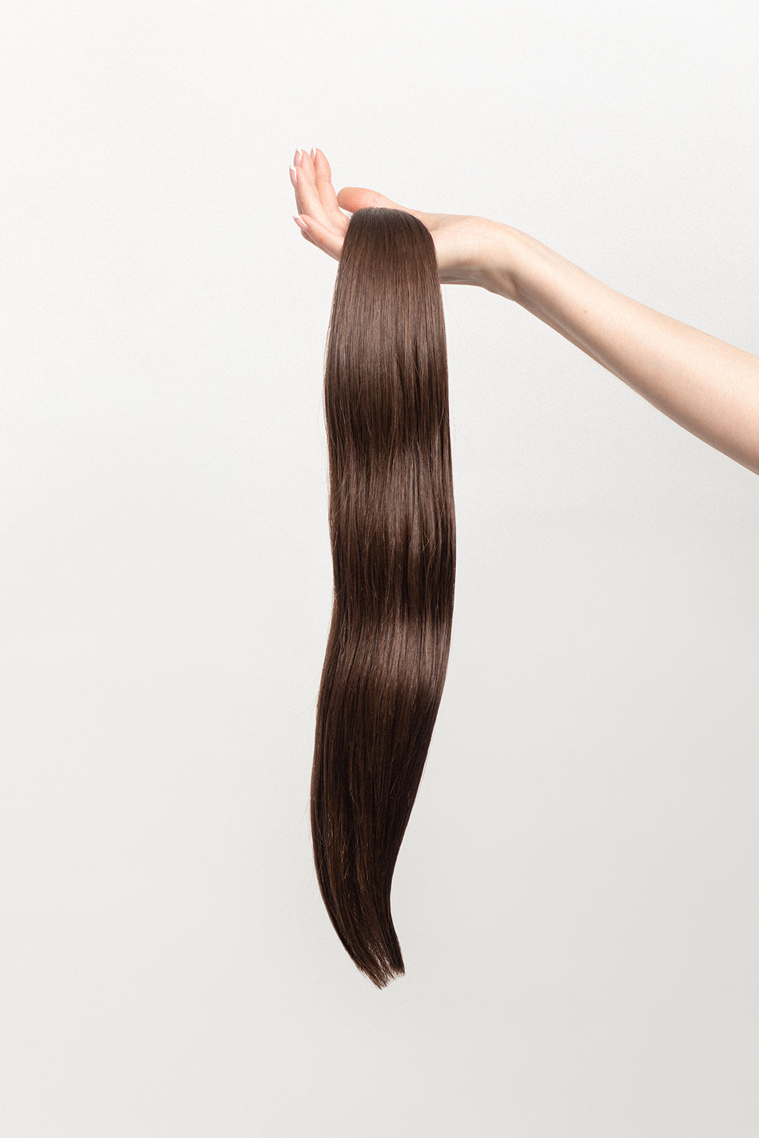 Sage is our medium brown, with golden undertones. Stylist lingo: Natural level 6 Hidden Harloc Clip-In Extensions are made from ethically sourced, Remy Slavic hair. They come with 5 seamless silicone wefts to ensure an undetectable result that is comfortable to wear. Whether you are looking to add volume or length, a stunning look for a special event, or just want to look and feel gorgeous. Available in 10 of our beautiful shades.
