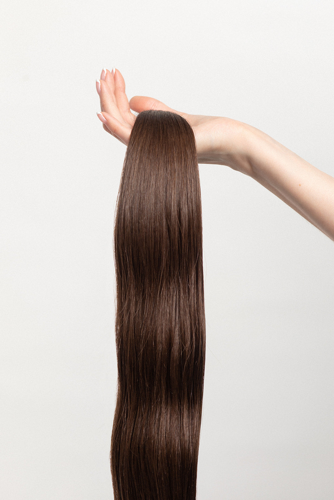 Sage is our medium brown, with golden undertones. This sage doesn’t need to be burned to ward off any bad energy. Stylist lingo: Natural level 6 Harloc Tape-In Extensions are made from ethically sourced, premium, Remy Slavic Hair. These reusable hair extensions can be used to add length, volume, chemical-free colour, or to correct or enhance a haircut. Available in 16 beautiful shades. Combine multiple colours to create a custom colour blend and perfect match.